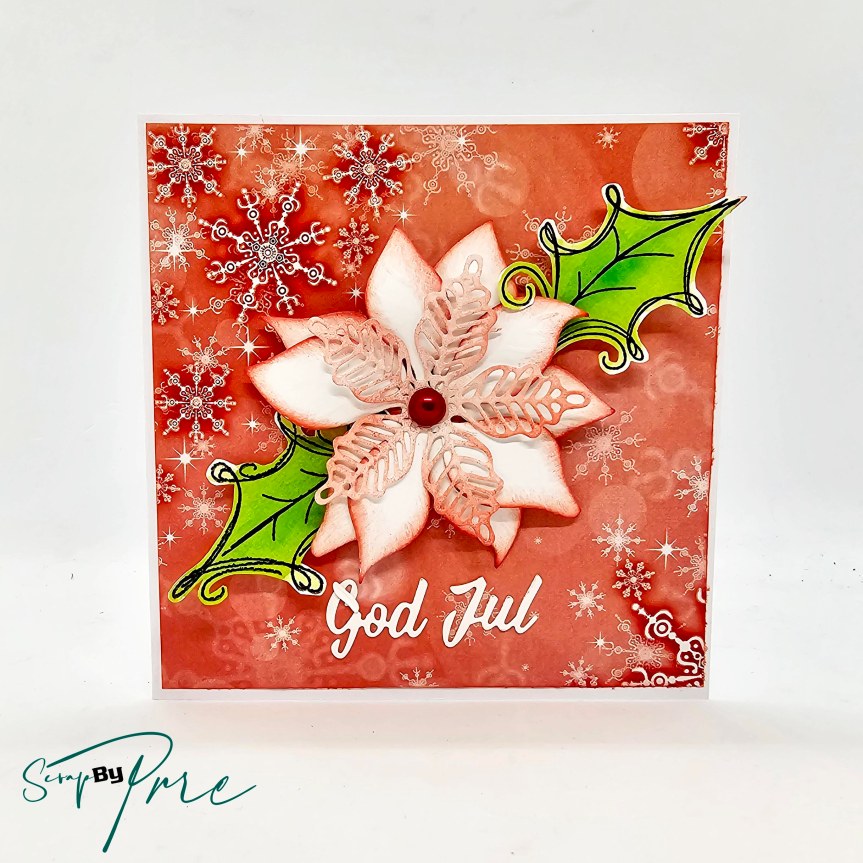 Red Christmas card with a die-cut poinsettia flower